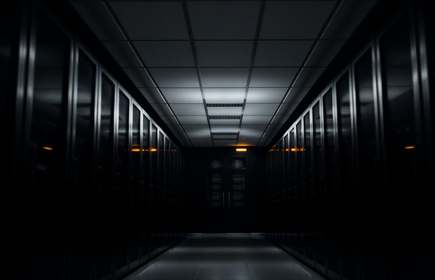 Long corridor of illuminated server racks